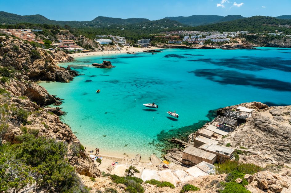 Turquoise waters of Cala Tarida, a must-see during your luxury holiday in Ibiza.