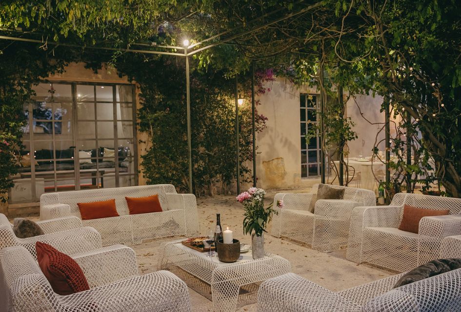 Evening shot of the outdoor lounge area of Villa Clos Mireille, a lovely private luxury villa in Provence.