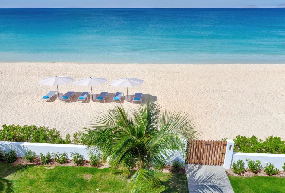 Drone view of the Caribbean Sea and the shores of Meads Bay from The Beach House in Anguilla, a lovely beach front villa.