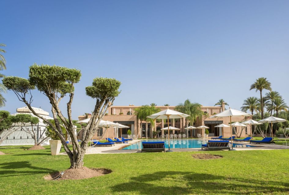 Garden and pool view of Noor El Jena Palace, one of our large private villas in Morocco.