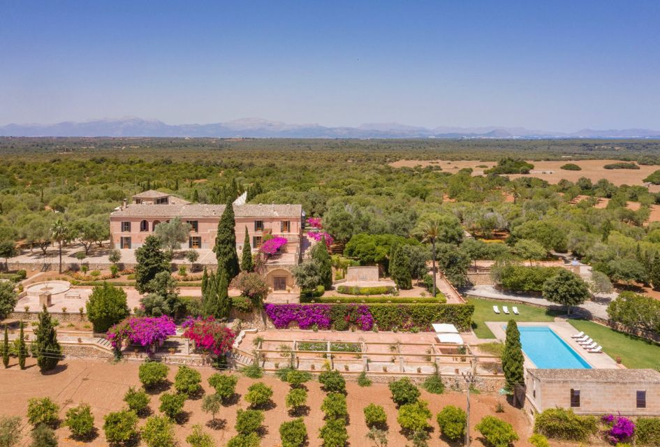 Drone view of Villa Son Doblons with the Mallorcan countryside in the background. A lovely large luxury villa in Mallorca.